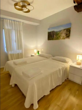 Habitación en apartamento con zonas comunes compartida HN